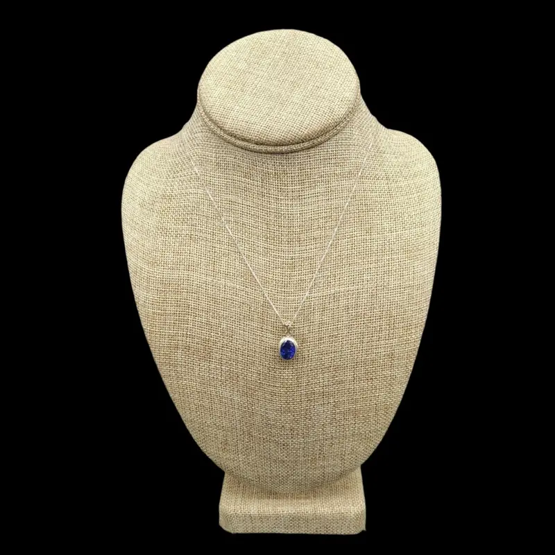 Tanzanite Oval Cabochon Pendant – Sterling Silver Jewelry Piece 1